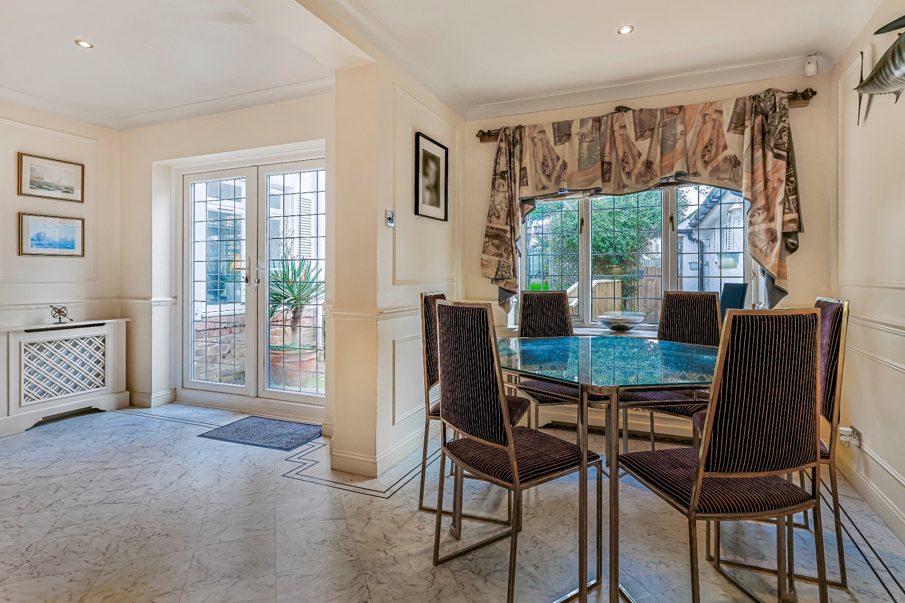 Dining nook beside the garden doors with soft natural light