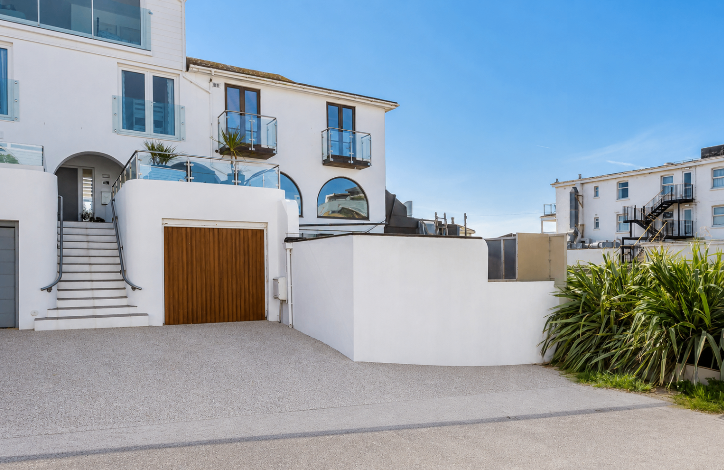 Front elevation of Chaddesley House with private driveway and garage