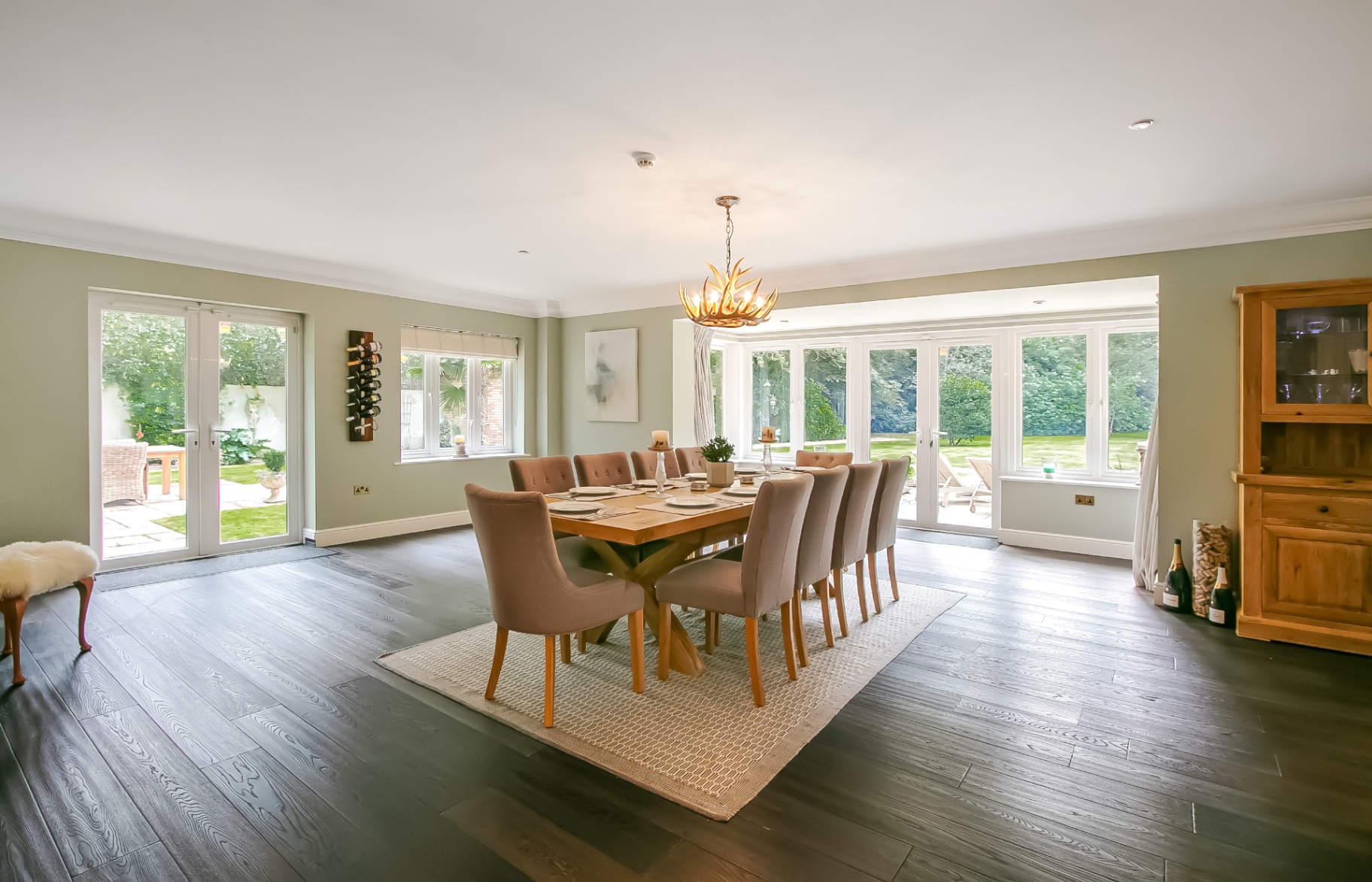 Formal dining room seating ten with garden views