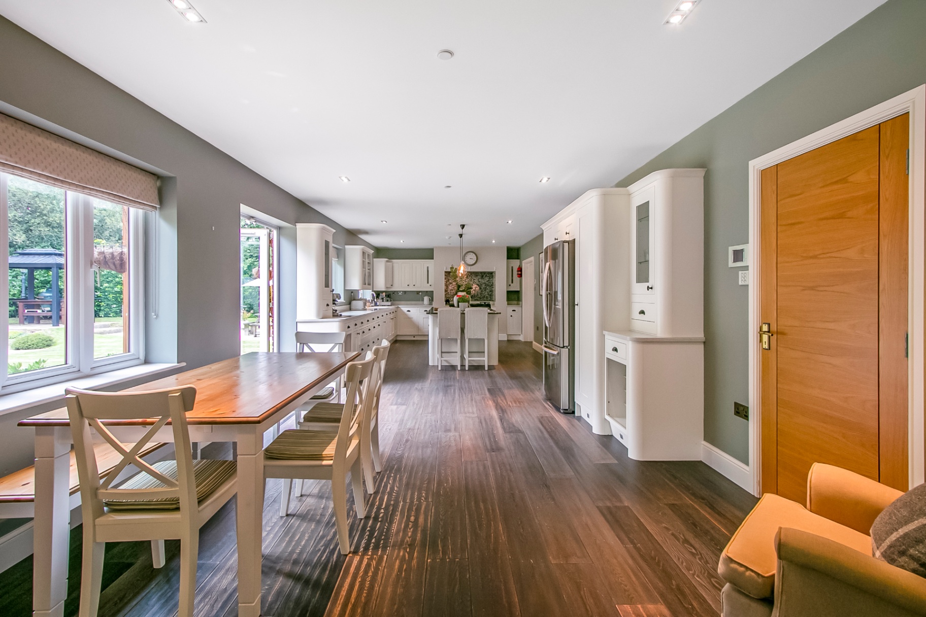 Open-plan kitchen with informal breakfast dining